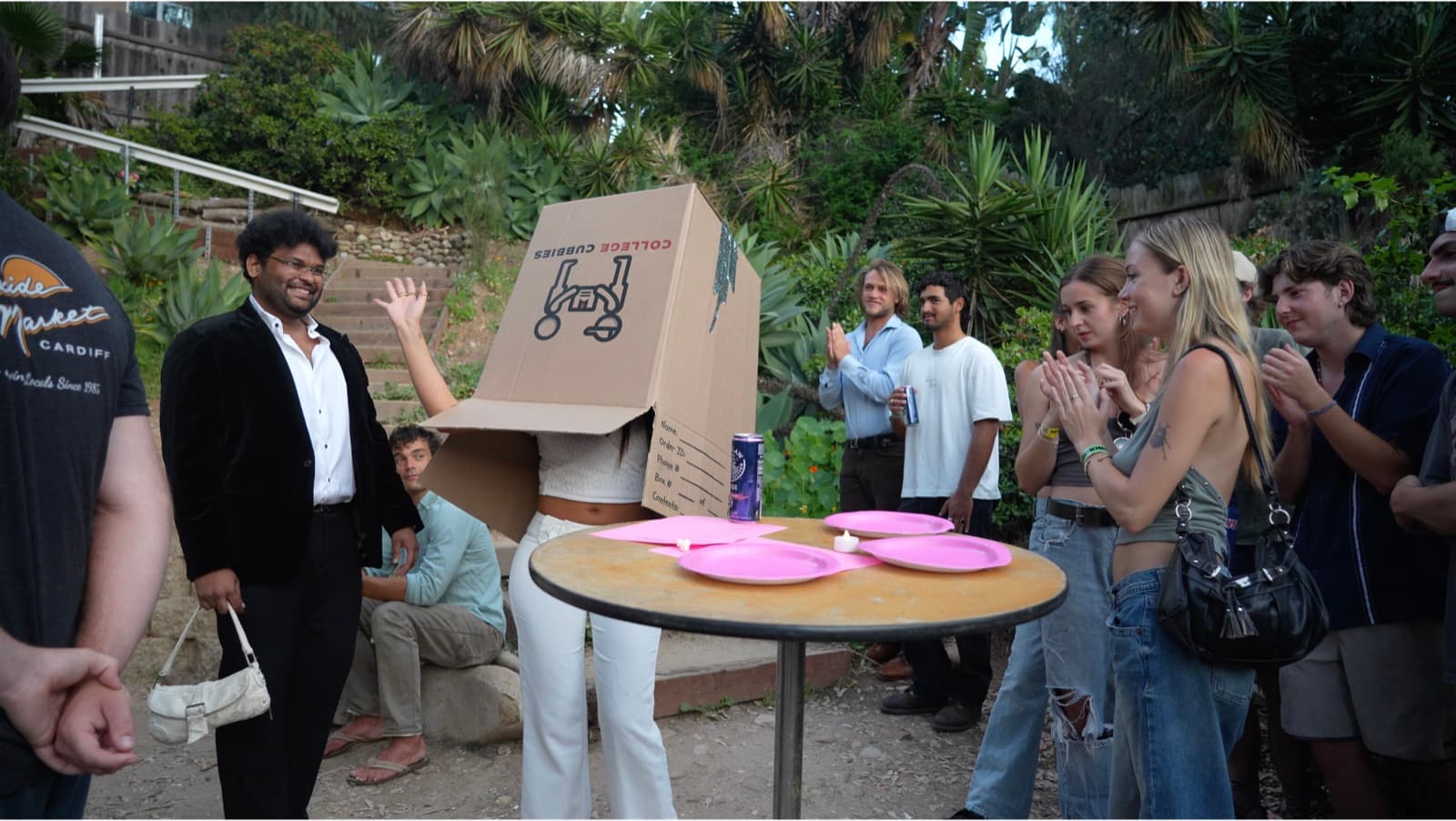 SDSU blind dating show: Ynessa descending under the cardboard, our budget blindfold.