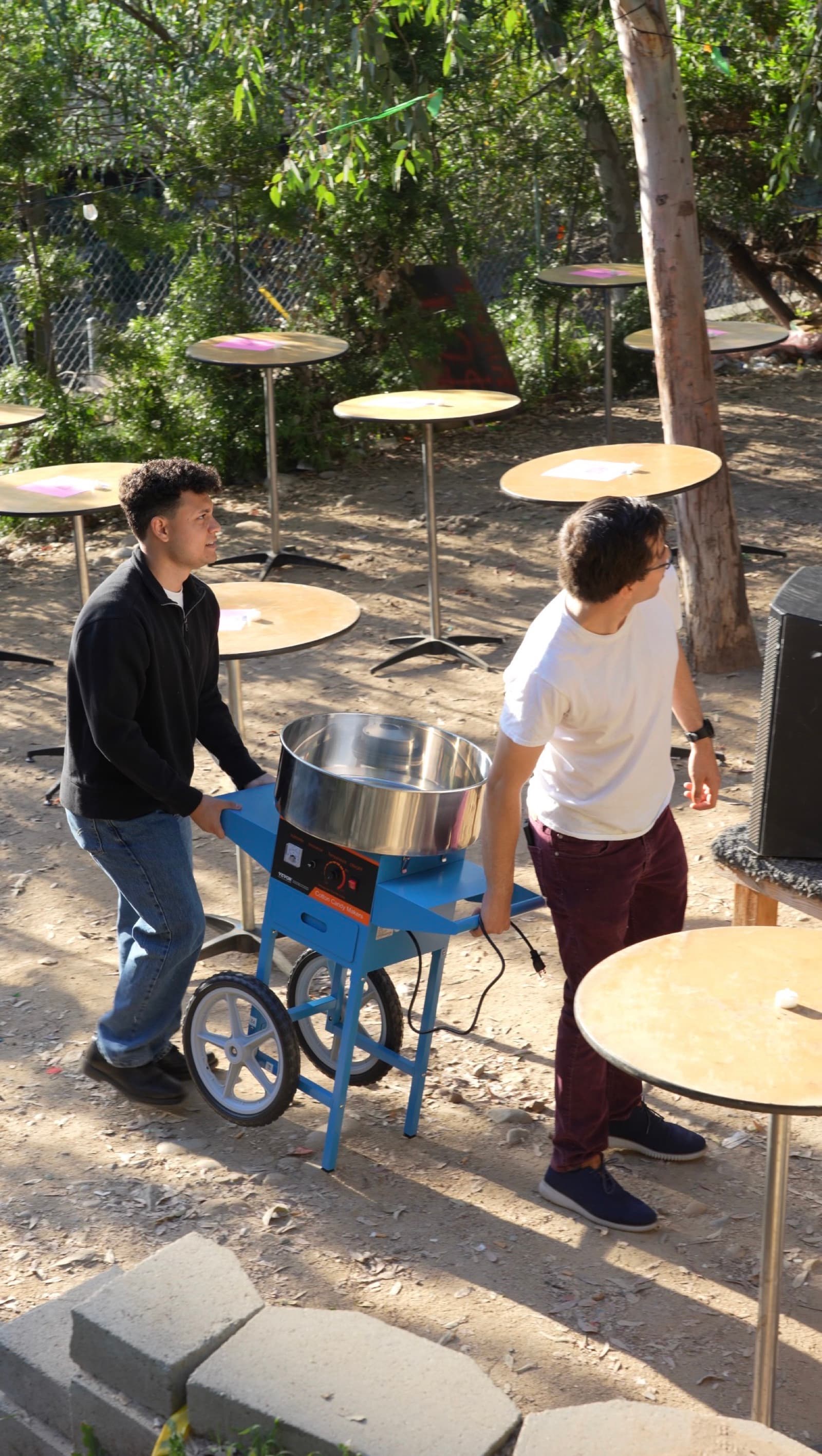 SDSU blind dating show: Brian and Jacob wheeling in the cotton candy machine.