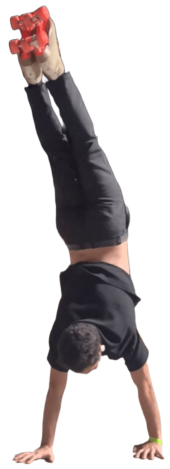 Mohammad doing a handstand on roller skates